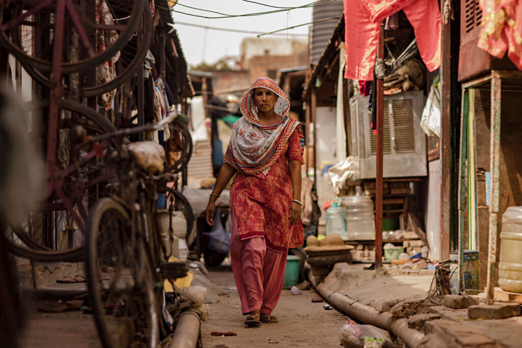 woman walking through a street market