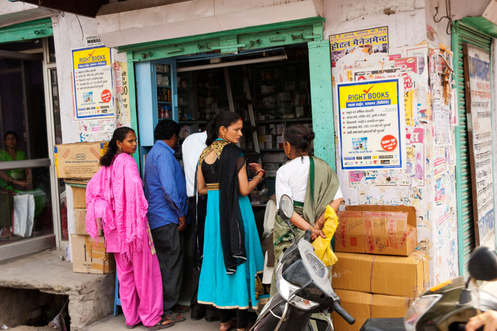 Multiple people waiting at store