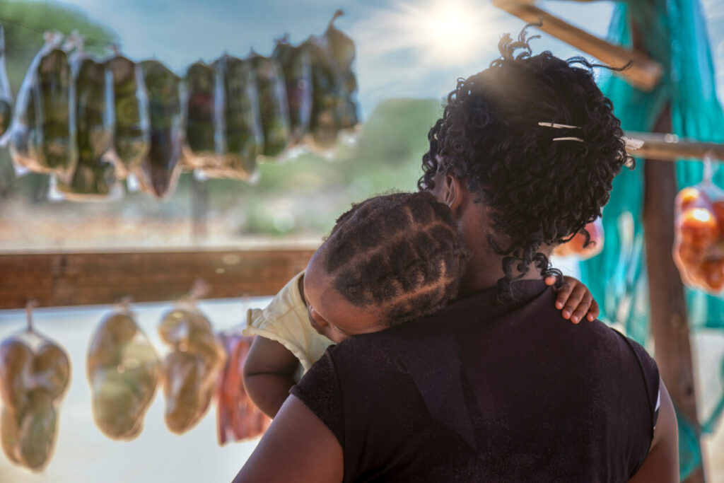 Woman holding child