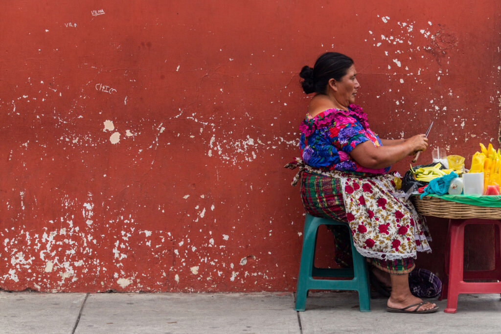 Woman cutting food outside